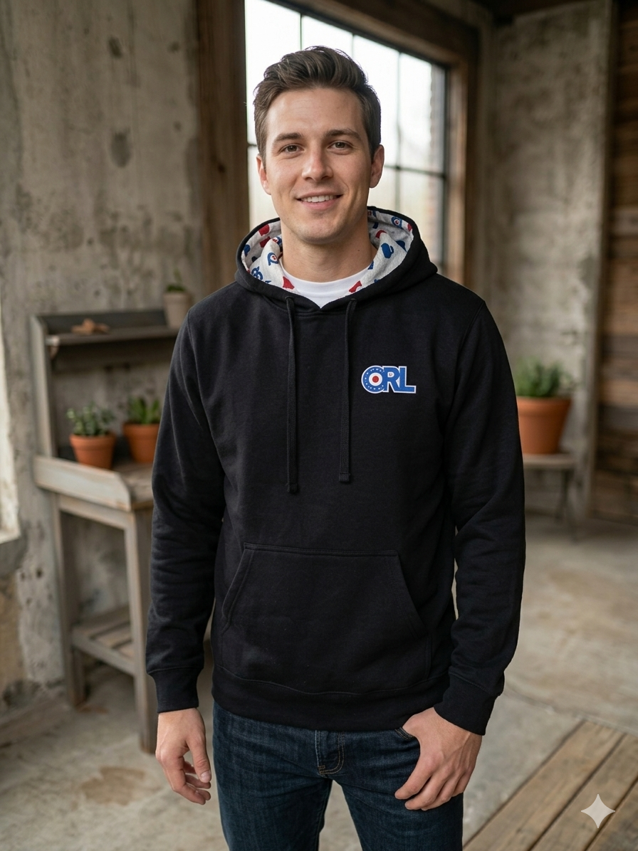 Man modeling a black CRL hoodie with ORL logo and a unique interior hood lining featuring Minnesota-inspired graphics.