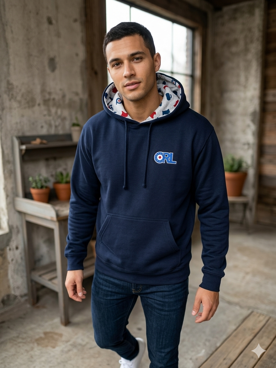 Man wearing a navy CRL hoodie featuring the ORL logo on the chest and a custom Minnesota-inspired patterned hood lining.