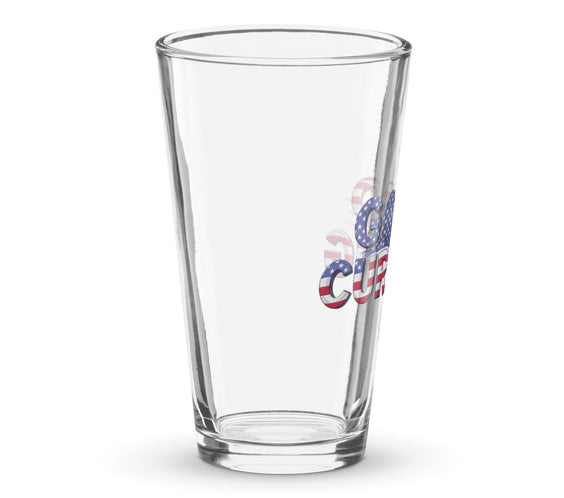 Angled side view of a clear shaker pint glass showing part of the “Good Curling” USA flag design in red, white, and blue. Patriotic curling drinkware by CRL.