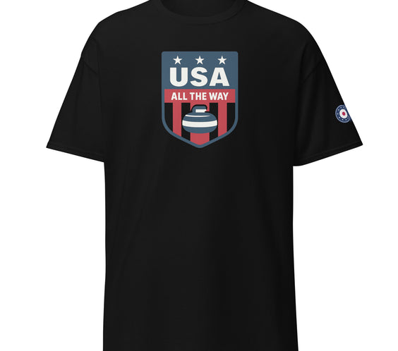 Black unisex T-shirt with “USA All The Way” curling shield logo in red, white, blue, plus curling target emblem on sleeve.